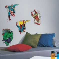 the avengers wall decals are on display in this bedroom