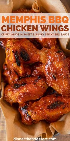 chicken wings with bbq sauce in a paper bag on a wooden table, text reads memphis bbq chicken wings crispy wings in sweet and sticky sticky bbq