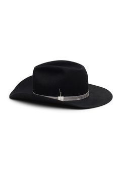 LIMITED EDITION – Discover our black fedora and cowboy hat hybrid Midnight Verve, a Western-inspired hat that combines the structured crown of a classic fedora with the bold, flanged brim of a cowboy hat. This unique piece features a striking silver band detail, repurposed from vintage royal uniforms, adding a touch of timeless elegance to its daring design. Midnight Verve captures perfectly the blend of rugged charm and regal allure. Each hat is handcrafted in our Stockholm studio, ensuring exc Black Fur Felt Hat Band For Rodeo, Black Fur Felt Hat Bands For Rodeo, Black Western Fur Felt Fedora, Western Black Fur Felt Fedora, Western Black Fedora In Fur Felt, Western Style Fedora With Flat Crown, Western Style Formal Top Hat With Flat Crown, Classic Black Fedora For Western-themed Events, Black Fedora With Curved Brim For Rodeo