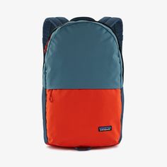 a blue and orange backpack on a white background