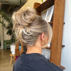 Blonde hair colored and styled into an updo bun leaving curtain bangs out. Cut, custom color and style at RMCM Salon in River North Chicago High Bun With Curtain Bangs, Curtain Bangs Bun, Curtain Bang Updo, Updo Curtain Bangs, Curtain Bangs Updo, Updo With Curtain Bangs, Ashlyn Ella, River North Chicago