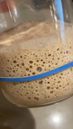 a close up of a blender filled with liquid