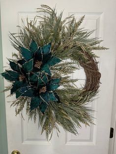 a wreath is hanging on the front door