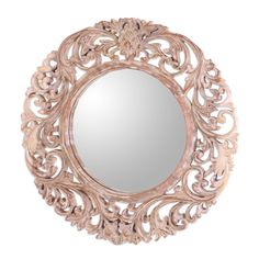 an ornately carved mirror is shown against a white background