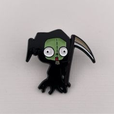 a green and black cartoon character with big eyes