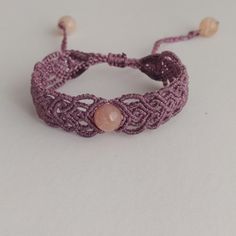 This bracelet is meticulously crafted using the macrame technique, featuring agate beads and polyester thread. Reflecting the boho hippie style, this bracelet stands out with its 2 cm width and 16 cm length woven part. With a total length of 30 cm, it fits any wrist thanks to its adjustable sliding lock. This stylish and comfortable bracelet is the perfect accessory to complete your look. Bracelet Stands, Boho Hippie Style, Hippie Stil, Fairy Aesthetic, Macrame Bracelet, Macrame Bracelets, Agate Beads, Hippie Style, Boho Hippie