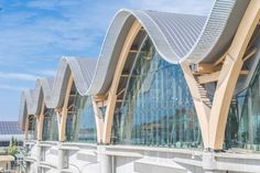 an architecturally designed building with curved windows