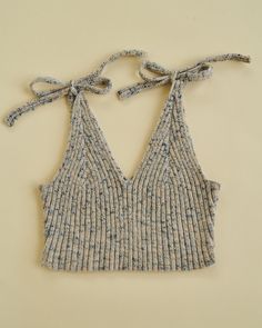 a crop top that is tied up to the side