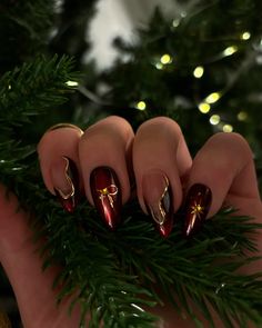 ✨♥️🎄 #nails #nailsnailsnails #handmade #handmadenails #qualitynails #gelnails #pressonnails #pressonsforsale #reuseable #rednails #longnails #chromenails #redandgold #christmas #christmasnails #christmasdinner #deeprednails #customorder #christmasgifts #christmasgift #christmasgiftideas Isolated Chrome Christmas Nails, Christmas Nails Jesus, Dark Red Nails With Charms, Dark Red Nails With Gold, Medieval Nails, Brown Christmas Nails, Winter Solstice Nails, Christmas Chrome Nails, Chrome Christmas Nails