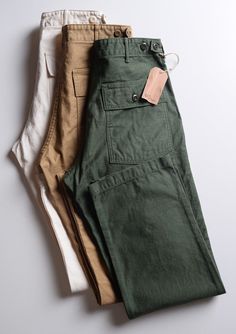 Orslow's affinity for American military wear combined with their exquisite attention to detail, make them the right brand to recreate the perfect pair of fatigues trousers that show appreciation for the past, but feel modern and fit into any contemporary wardrobe. Their relaxed fit and straight leg is ultra-comfortable yet tailored, and the substantial back and front pockets allow for adequate storage while you're on the go. The waistband offers both belt loops and adjustable side tabs to tweak Chino Cotton Twill Cargo Pants For Work, Chino Cotton Twill Straight Cargo Pants For Work, Workwear Straight Chino Cotton Twill Cargo Pants, Military Style Cotton Pants With Flap Pockets, Utility Chino Cotton Twill Pants With Pockets, Utility Pants In Chino Cotton Twill With Pockets, Relaxed Fit Chino Cotton Twill Pants With Cargo Pockets, Utility Style Relaxed Fit Chinos With Belt Loops, Military Straight Leg Pants With Pockets