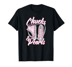 chucks and pearls t - shirt with pink lettering on the chest, in front of a