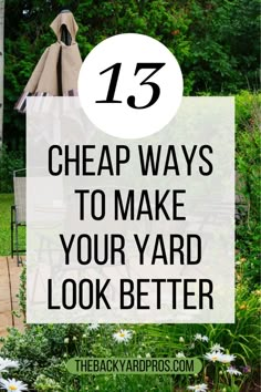 the back yard with flowers and an umbrella that says, 13 cheap ways to make your yard look better