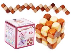 a box of wooden pegs next to a game