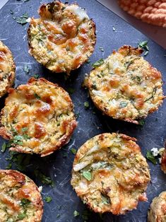 several small muffins with cheese and herbs