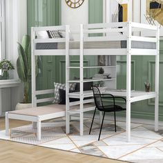 a bunk bed with a desk and chair underneath it in a room that has green walls