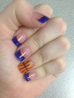 Blue and orange Basketball Solar Nails by Friendly Nails Cute Basketball Nails, Nail Designs Basketball, Nails For Basketball Players, Denver Nuggets Nails, Basketball Nails Acrylic, Blue Basketball Nails, Basketball Acrylic Nails, Cheer Nails Designs, Basketball Nails Designs