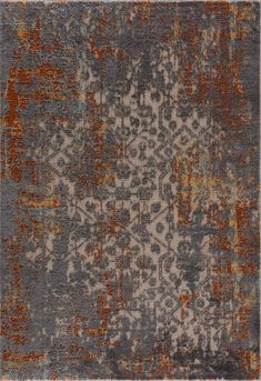 an area rug with various colors and patterns on it, including oranges, grays, and browns