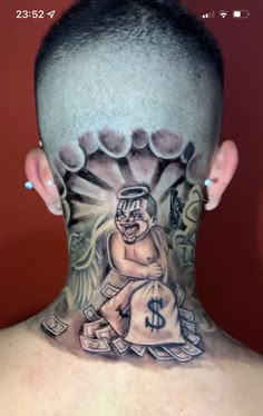 the back of a man's head with tattoos and money bags on his neck