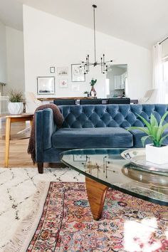 a living room filled with furniture and a rug