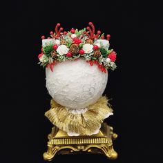 Beautiful and unique baby  Prop. It is handmade with bright red green and white  flowers. These tiny red gliterry antlers are no more then 2 1/2 inches wide and high.  It is decorated ears and mini pinecones with christmas greenery, red and white berries.   It sits on felt to protect babies head and for comfort with stretchy stands to adjust to size.   Fits from  Sitter Toddler or little girl.  Fun to wear on Christmas or perfect for a photo session.   Just caution with this item as it contains small objects and babies should not be left unattended.   Thank you so much for browsing Ribbows Boutique.   Adela Headpiece Flowers, Forest Crown, Mini Pinecones, Antler Crown, Winter Reindeer, Crown Headpiece, White Berries, Christmas Hair Accessories, Red And White Flowers