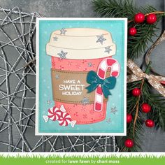 a handmade christmas card featuring a jar of candy