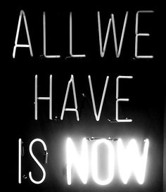 a neon sign that says all we have is now