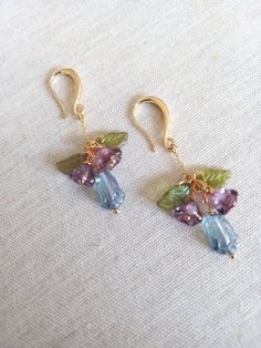 Beautiful pair of dainty Bluebell Earrings made with Czech glass flowers. The bluebell flowers hang from gold filled chains on gold plated ear wires. Arrives in a jewellery box, perfect for gifting. If you need a bigger quantity or any customized jewellery for your very special occasion (birthdays, weddings, bridal showers or any other event), please send me a message and I'll be glad to help. Dainty Blue Drop Earrings, Dainty Blue Earrings For Wedding, Blue Single Dainty Earring, Blue Dainty Single Earring, Blue Dangling Beads Earrings For Wedding, Dainty Blue Dangle Earrings, Blue Wedding Earrings With Dangling Beads, Blue Cluster Drop Earrings For Pierced Ears, Bluebell Earrings