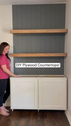 a woman standing next to a white cabinet with shelving above it and the words diy plywood countertops