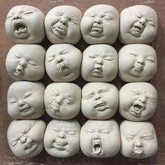 many faces are shown in the shape of heads with mouths open and eyes wide open