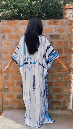 "All dresses are custommade- ONLY FOR YOU! Kaftan,RAYON Caftan, Long Robe, Summer Dress, Long Maxi, Loungewear, beachwear, Maternity Dress, Holiday, Vacation Wear The beauty of this kaftan is - -This lovely tie-dyed Indian kaftan is perfect for the poolside, beach or cruise holiday , anniversary gifts or as lounge wear. -It is Blue-turquoise-white-Indian hand tie-dyed - as pictured. Measurements- High quality soft rayon- not transparent! Width- Chest:waist: Hips - 68 inches around - FITS UPTO US White Bohemian Maxi Kimono, White Bohemian Maxi Length Kimono, Free Size Batik Print Maxi Dress For Festival, Festival Free Size Batik Print Maxi Dress, Festival Free Size Maxi Dress With Batik Print, Long Free Size Batik Print Dress, Free Size Long Batik Print Dress, Long Batik Print Dress, One Size, Bohemian Short Sleeve Thobe For Beach