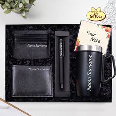 a personalized travel set in a gift box with a note, pen and coffee mug