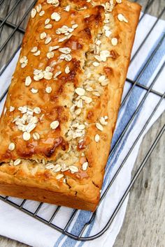 a loaf of bread sitting on top of a cooling rack