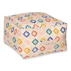 a square shaped pillow with colorful designs on it