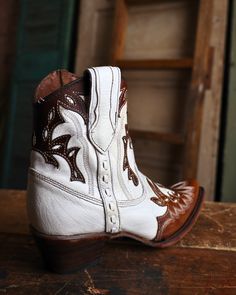 Whether you're looking for a statement piece to make heads turn or a versatile option for everyday wear, Circle G by Corral​ boots offer an unparalleled range of options to cater to your taste. 7.5" Height Leather ​Pearl White Cognac Overlays Snip Toe Leather Lining ​Leather Outsole Single Stitch Welt Western Heel Pull On Pull Straps​ Embroidery Boots, Corral Boots, Pearl Leather, Pearl White, Cognac, Cowboy Boots, Statement Pieces, Camel, Everyday Wear