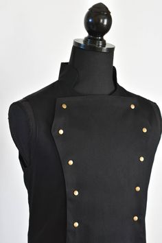 -Mens Steampunk Vest -  FEATURES: This elegant steampunk inspired vest has been 100% handmade from all cotton fabrics.  The vest incorporates a double breasted design, featuring brass metal press studs.  The vest is made to a high quality and is fully lined.  All fabrics, threads and accessories are of high quality. This is a 100% handmade and sustainable garment.  If there is any customisation you may want, send though a Custom Order conversation. SHIPPING: All shipping is shipped by Air Mail a Fitted Steampunk Vest For Cosplay, Steampunk Sleeveless Vest With Buttons, Gothic Black Vest For Costume Party, Black Gothic Vest For Larp, Gothic Cotton Vest For Alternative Fashion, Black Fitted Vest For Cosplay, Fitted Alternative Style Winter Vest, Fitted Alternative Winter Vest, Alternative Style Fitted Winter Vest