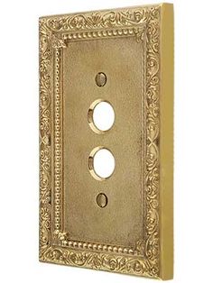 an antique style light switch plate cover