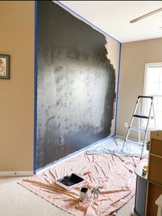 a room that has some paint on the wall