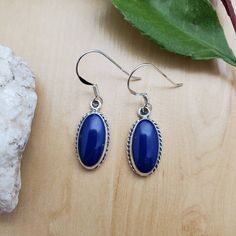 Visit our on-line shop at: Etsy.com/shop/AlbuquerqueDesigns *sterling silver earrings *dangle earrings *classic bezel settings *lapis blue stone *stone size: 14x7mm oval *these items are made to ship, slight variations in stones will occur *handcrafted in Albuquerque, New Mexico, USA *free convenient gift box *free shipping in USA *ready to ship Keywords: #SoCute925 Visit shop: AlbuquerqueDesigns.etsy.com Lapis Jewelry, Lapis Earrings, New Mexico Usa, Earrings Classic, Lapis Blue, Jewelry Dainty, Blue Lapis, Earrings Blue, Silver Earrings Dangle