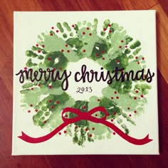 a handprinted christmas card with the words merry christmas