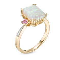 Fashioned in 10K gold, this three stone ring features a 10.0 x 8.0mm emerald-cut lab-created opal center stone flanked on either side by two lab-created pink sapphires with diamond accents lining the ring's shank. Frame Ring, Opal Ring Gold, Three Stone Ring, Engagement Rings Opal, Tourmaline Ring, Emerald Stone, Pink Ring, Cute Rings, Sapphire Stone