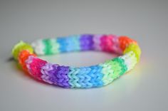 a bracelet made with multicolored crochet