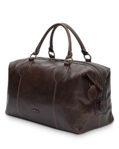 Travel in style with the clean lines and durable design of this leather bag from Frye. Elegant Formal Leather Weekender Bag, Formal Soft Leather Rectangular Weekender Bag, Formal Rectangular Soft Leather Weekender Bag, Classic Formal Tote Duffle Bag, Elegant Soft Leather Rectangular Travel Bag, Elegant Rectangular Soft Leather Travel Bag, Rectangular Calf Leather Travel Bag, Classic Everyday Calf Leather Bag, Classic Everyday Bags In Calf Leather