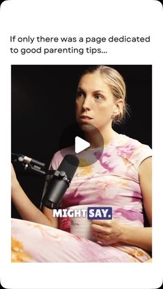 a woman sitting in front of a microphone talking to someone