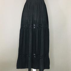 Mexican Artisanal Skirt - One Size (S/M) - Black Artisanal Skirt Made In Oaxaca, Mexico, With Elastic On The Waist. (There May Be Some Variations In The Color Depending On The Brightness Of Your Screen). Fabric: Manta Black Long Dress With Lined Skirt, Black Skirted Dress With Gathered Skirt, Black Skirted Dress With Flowy Skirt, Black Dress With Gathered Skirt, Black Dresses With Flowy Skirt, Black Dress With Flowy Skirt, Black Cotton Flowy Maxi Skirt, Black Cotton Maxi Skirt Relaxed Fit, Summer Black Cotton Maxi Skirt