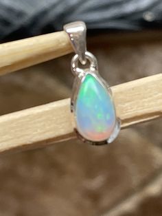 Handmade, natural product Stone: Genuine Ethiopian Opal Metal: 925 sterling silver Gemstone size: 12mm X 6mm Multicolor Sterling Silver Drop Jewelry, Multicolor Drop Sterling Silver Jewelry, Sterling Silver Teardrop Jewelry With Bail, Silver Opal Drop Jewelry, Natural Rock, Sterling Silver Pendant, Ethiopian Opal, Sterling Silver Pendants, Turquoise Ring