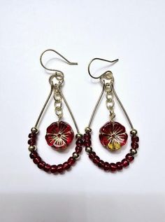 Red And Gold Czech Flower Dangle Hoop Earrings 2. 3/4 inches Long Red And Gold Czech Flower Earrings 2 - 14mm Hawaiian Hibiscus Red Pansy Czech Glass Flower Beads 24 - 4mm 6/0 Glass Red Seed Beads 8 - 4mm Gold Round Metal Beads 2 -  4mm Gold Oval Chain Components 2 - 8mm Gold Jump Rings 2 - 25x45mm Gold Tear Drop Hoops 2 - Handmade Gold Ear Wires "New excellent condition handmade jewelry has never been worn." Handmade Beaded Jewelry - is a popular choice for many due to its unique Fashions and One-of-a-kind styles. Customers can return jewelry for free repairs if needed.  Please note that if the jewelry is returned for repairs the customer is responsible for all shipping costs Hibiscus Red, Hawaiian Hibiscus, Dangle Hoop Earrings, Handmade Beaded Jewelry, Flower Beads, Long Red, Handmade Gold, Tear Drop, Red And Gold