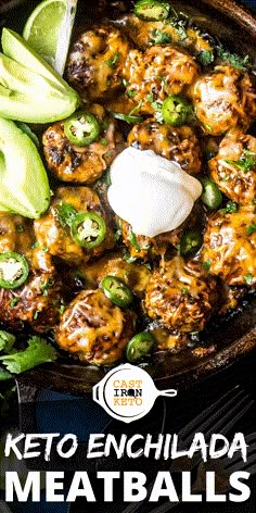 keto enchilada meatballs in a skillet with sour cream on top