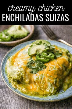 the enchiladas are topped with guacamole and avocado