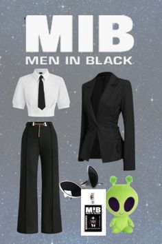 a man in black suit and tie standing next to an alien