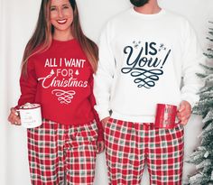 This eye-catching Christmas Shirts are going to be a perfect fit for your couple holiday look! <3  Choose Size > Choose Color > Add to Cart > REPEAT " PLEASE READ THE DESCRIPTION BEFORE PURCHASING     👕 Sizes & Fit  * Unisex Crewneck Sweatshirt, classic loose fit (Gildan 18000)  * For an oversized fit, select two or three sizes up from your normal size  * Sizing is unisex so runs like men's, though not overly large  * Most women find their typical size works best, since they are meant to be a b Christmas Pajamas For Couples, Pajamas For Couples, Couple Holiday, Christmas Family Photoshoot, Couples Holiday, Couples Christmas, Matching Christmas Shirts, Personalized Matches, Cute Couple Outfits